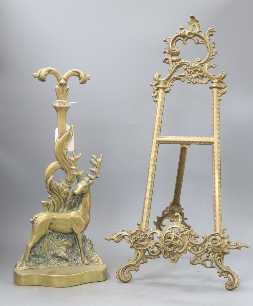 A deer door porter and a brass easel, height 55cm